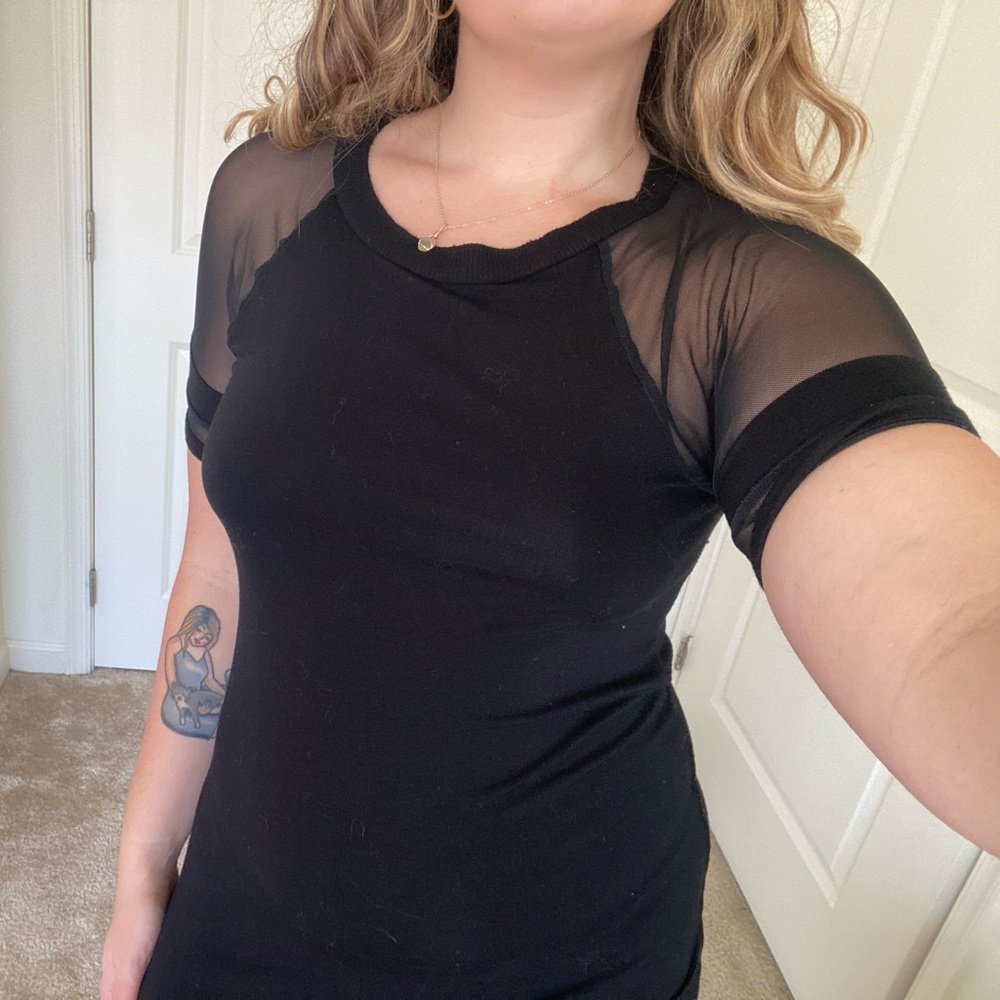 black skater dress with mesh sleeves